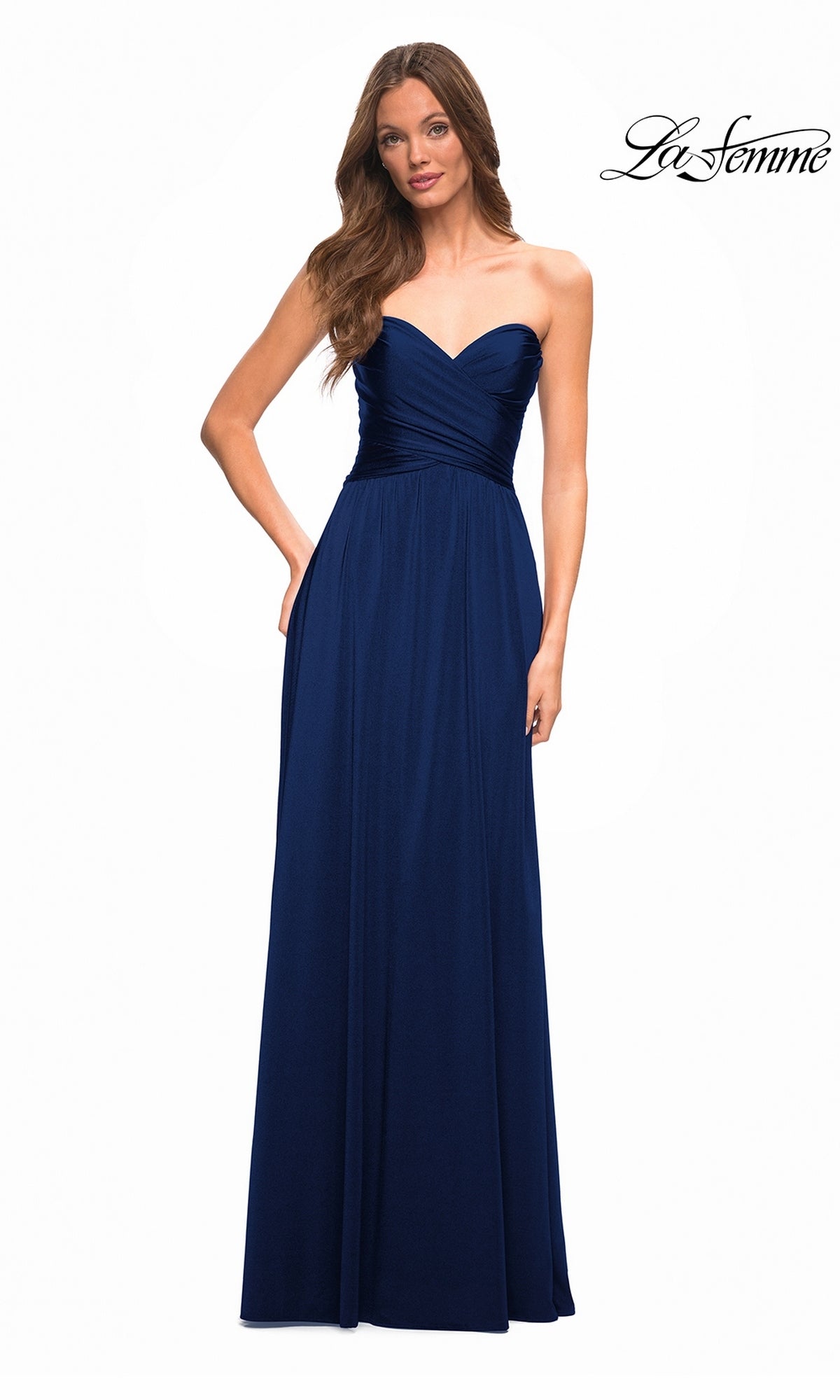 Woman in Long Prom Dress: La Femme 30700—strapless, fitted bodice, high-leg slit—standing against a white background. “La Femme” logo appears top right.